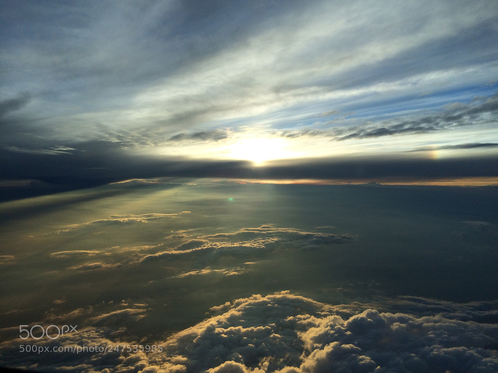 Apple iPhone 5s sample photo. Vibrant sunset amidst clouds photography
