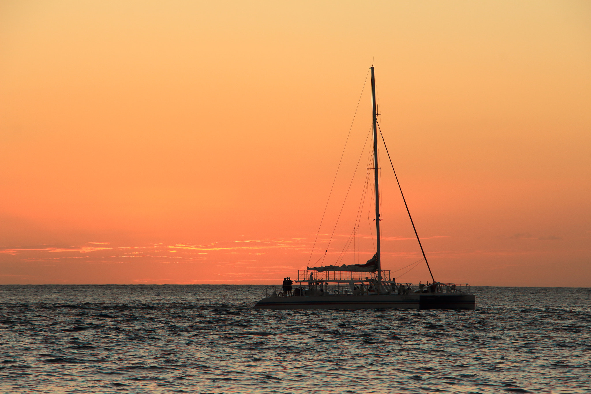 Canon EOS 700D (EOS Rebel T5i / EOS Kiss X7i) + Canon EF-S 18-135mm F3.5-5.6 IS STM sample photo. Smooth sailing in the caribbean at sunset twilight photography