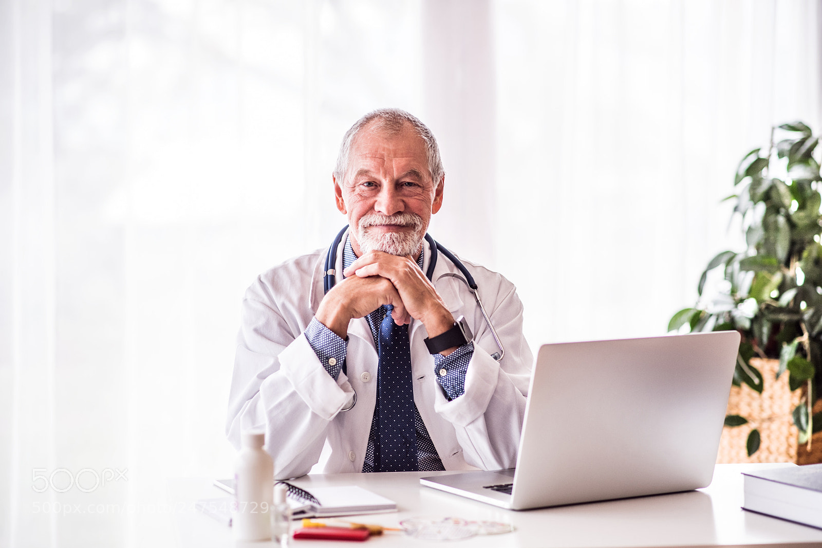 Nikon D5 sample photo. Senior doctor with laptop photography