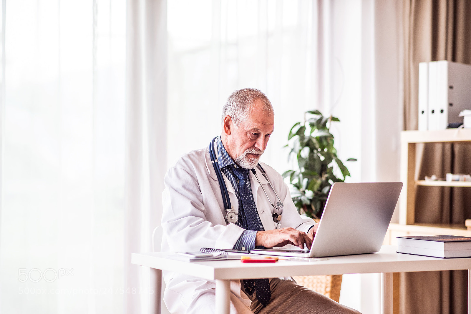Nikon D5 sample photo. Senior doctor with laptop photography