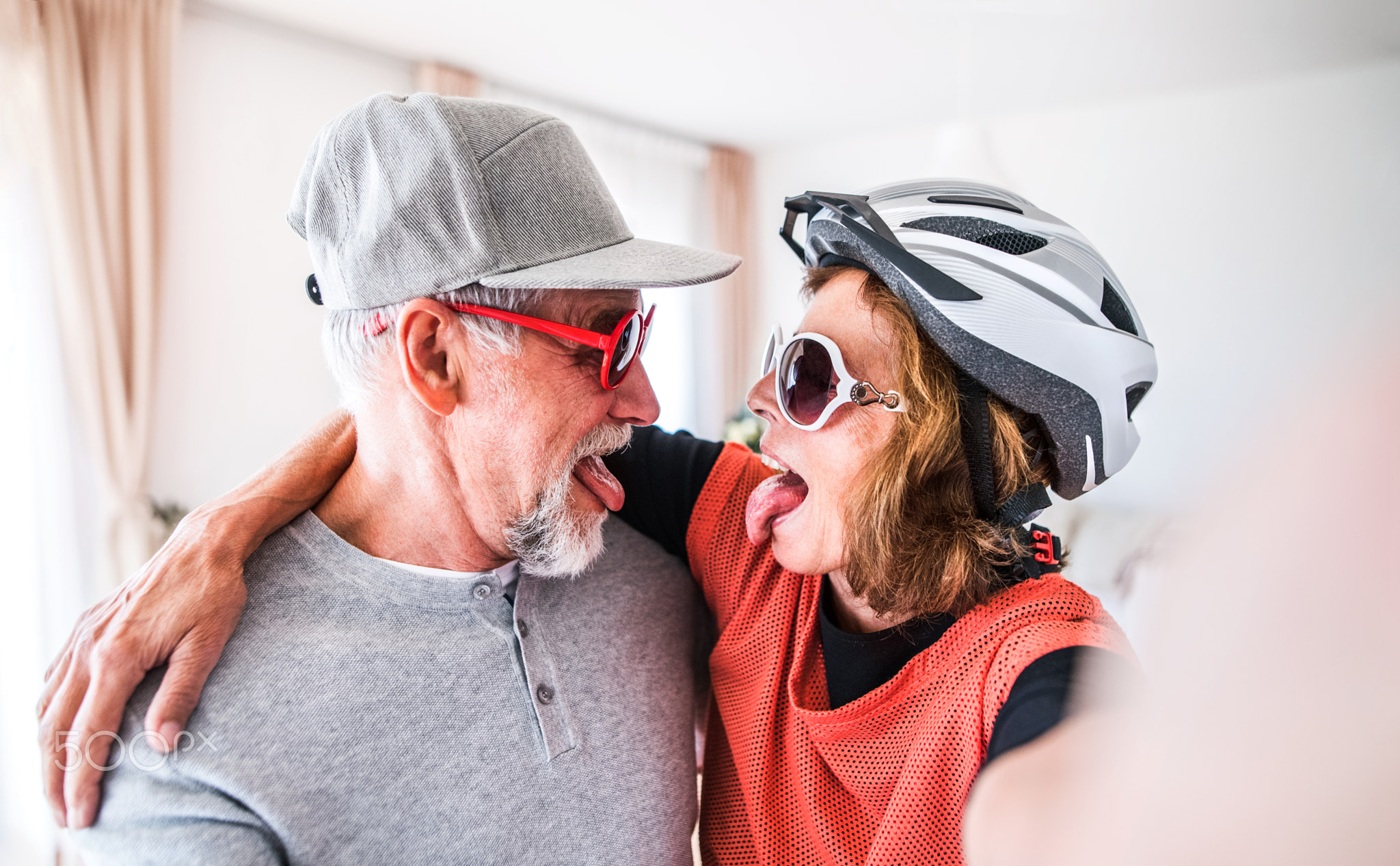 Senior couple having fun at home.