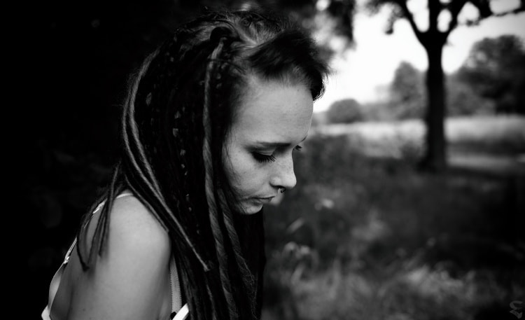 a girl with dreads