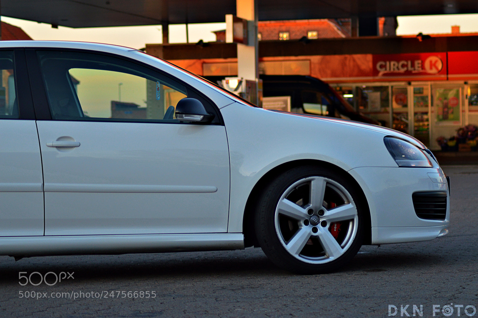 Nikon D3200 sample photo. White car at gas photography