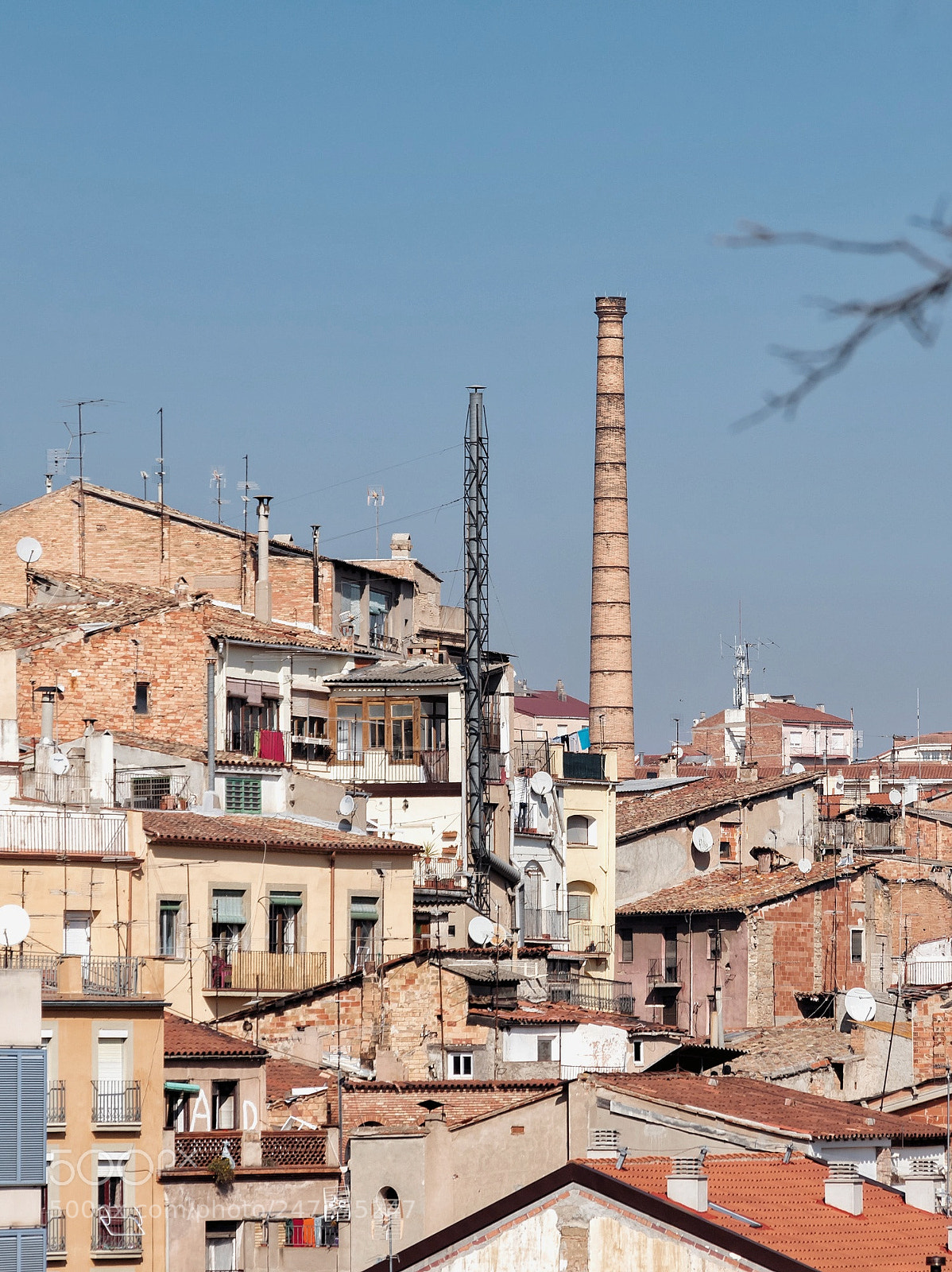 Pentax K-70 sample photo. Rooftops, windows and a photography