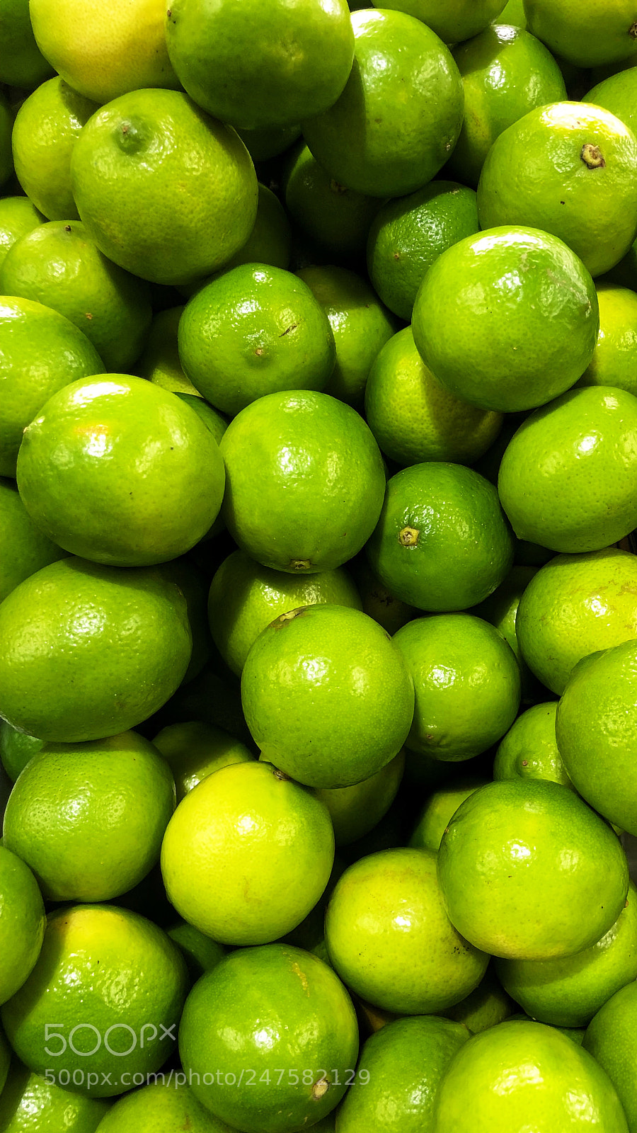 Apple iPhone X sample photo. Green lemons photography
