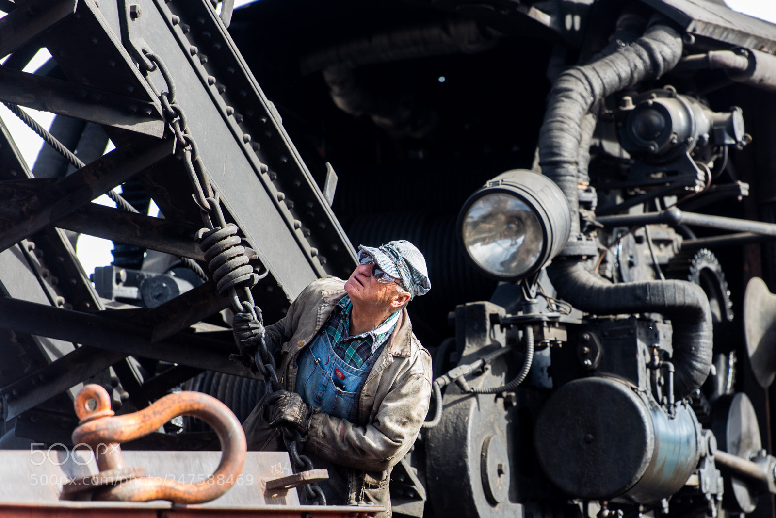 Nikon D810 sample photo. A worker looks a photography