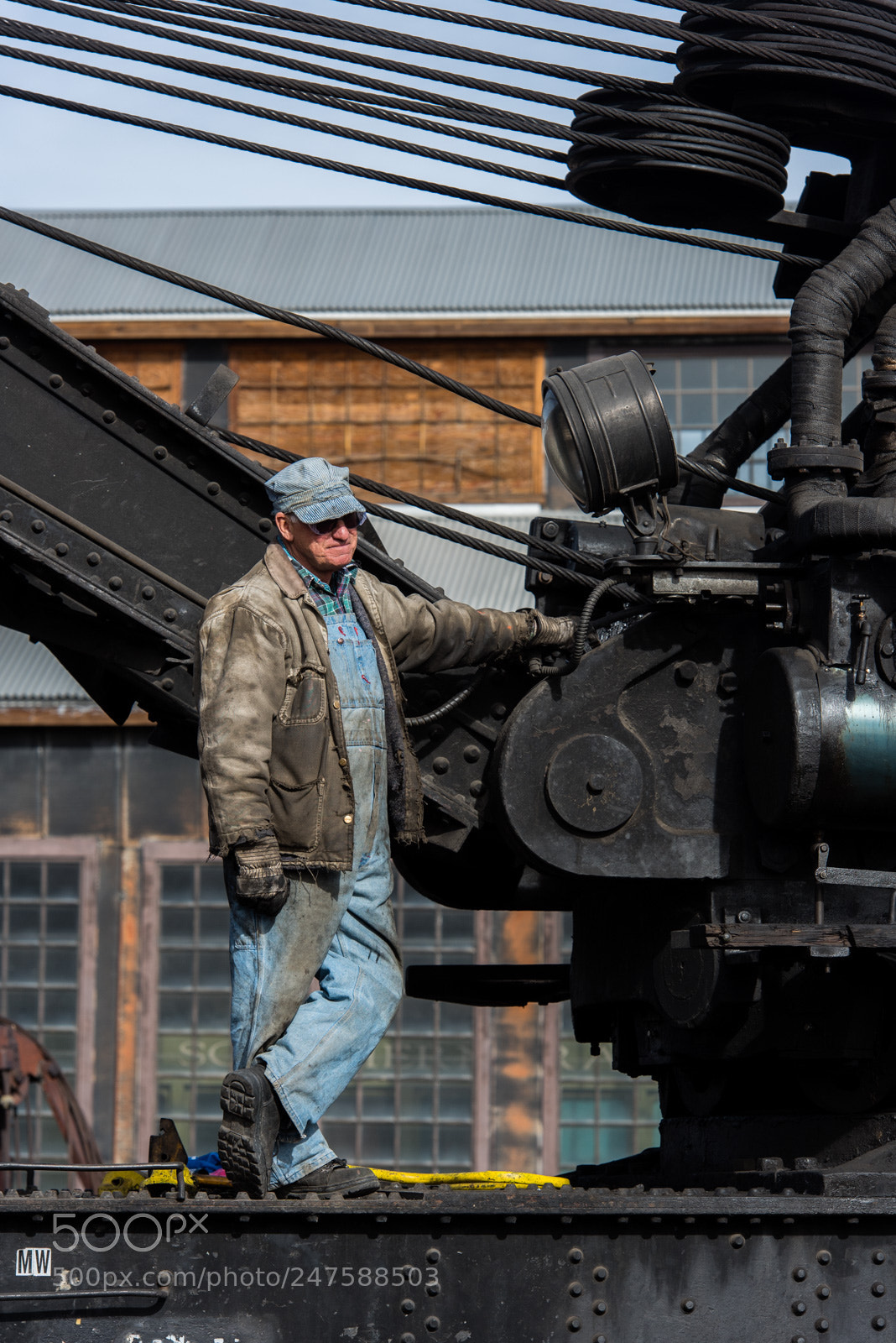 Nikon D810 sample photo. A worker pauses on photography