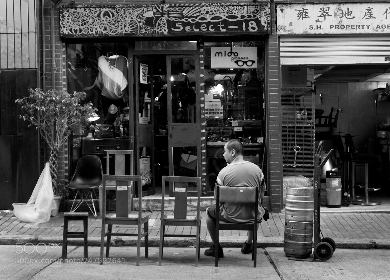 Sony Alpha NEX-5N sample photo. A man sits on photography