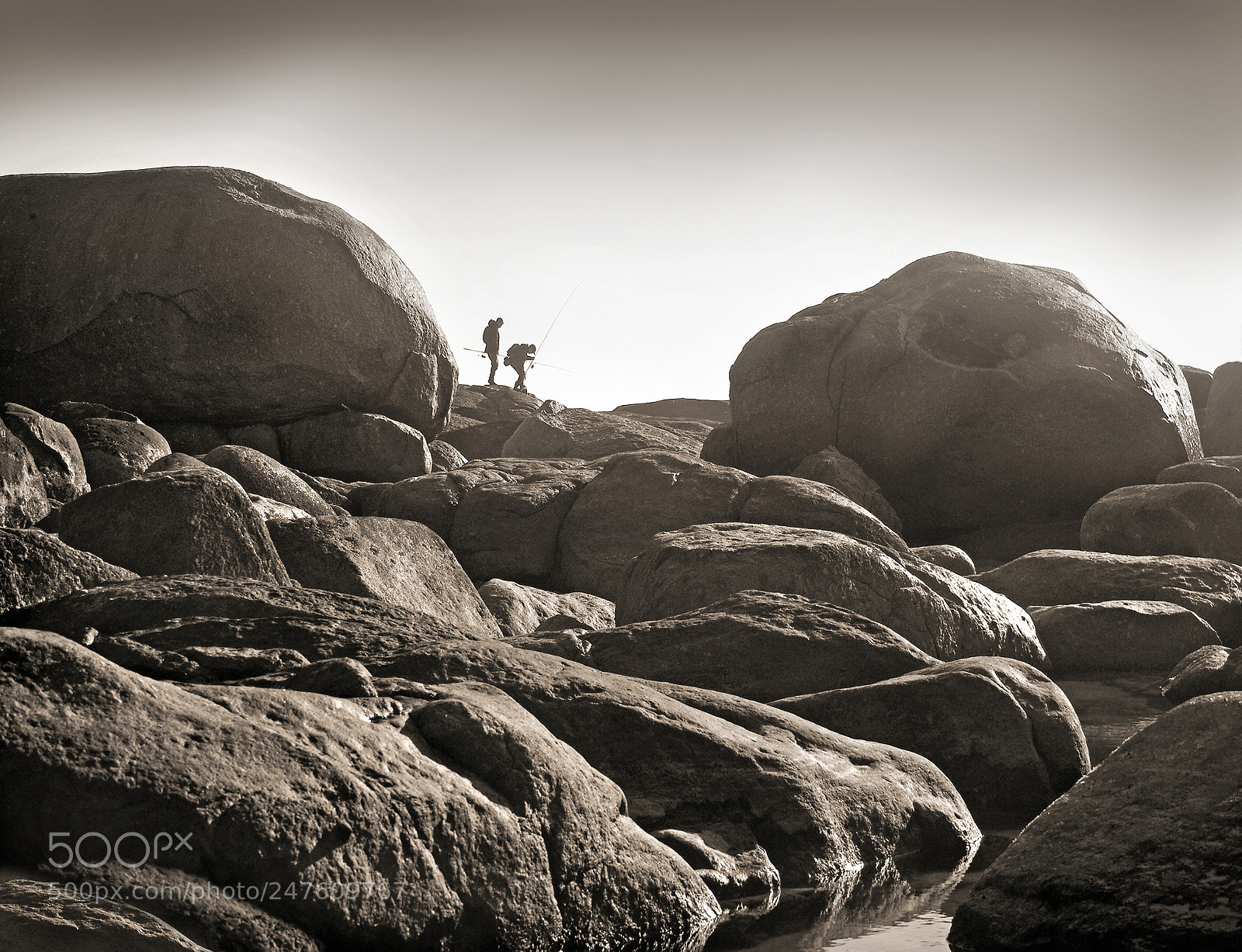 Pentax K20D sample photo. Rocky coast fishermen photography