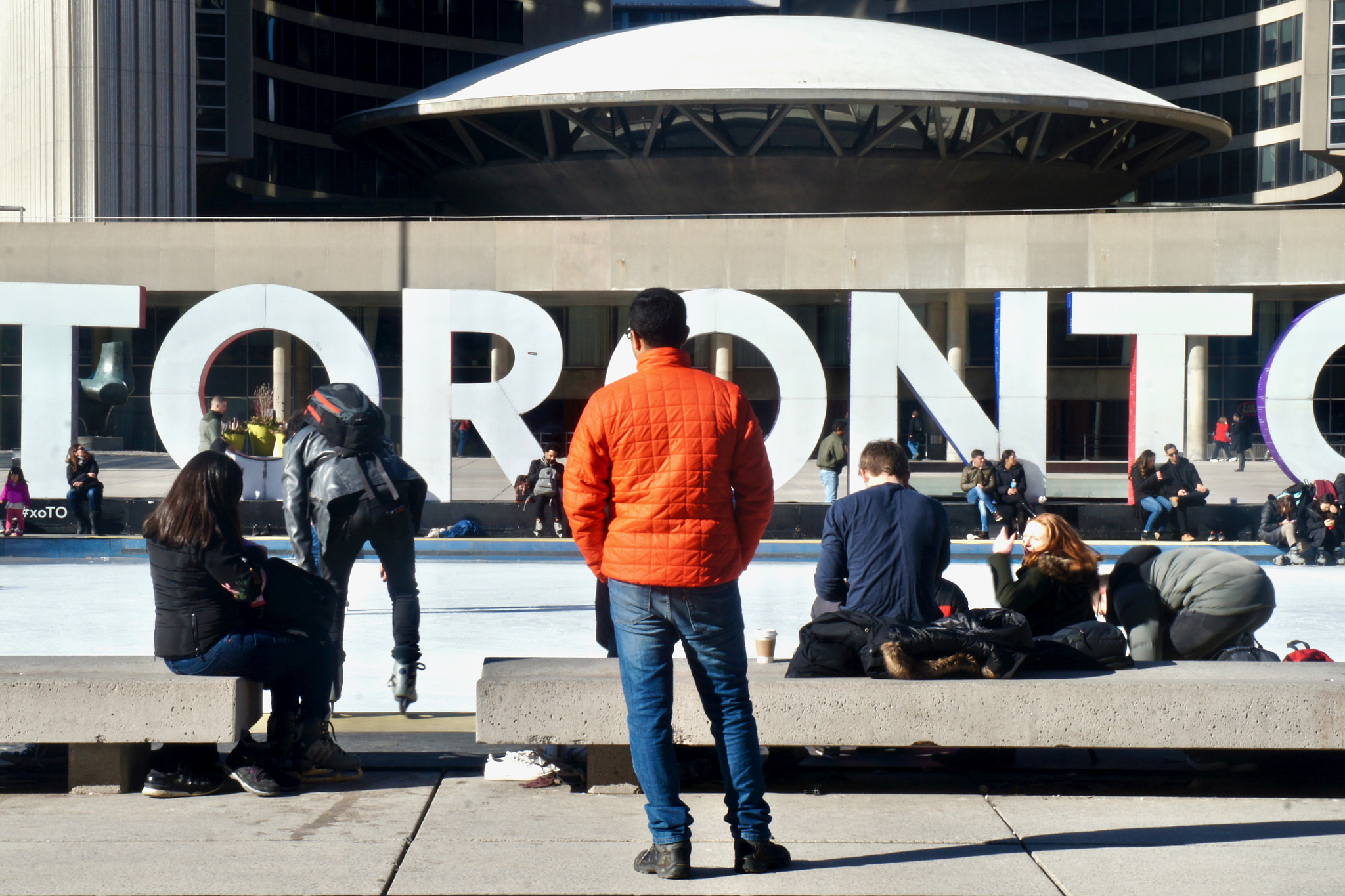 Sony Alpha NEX-C3 sample photo. Man at nathan phillips square photography