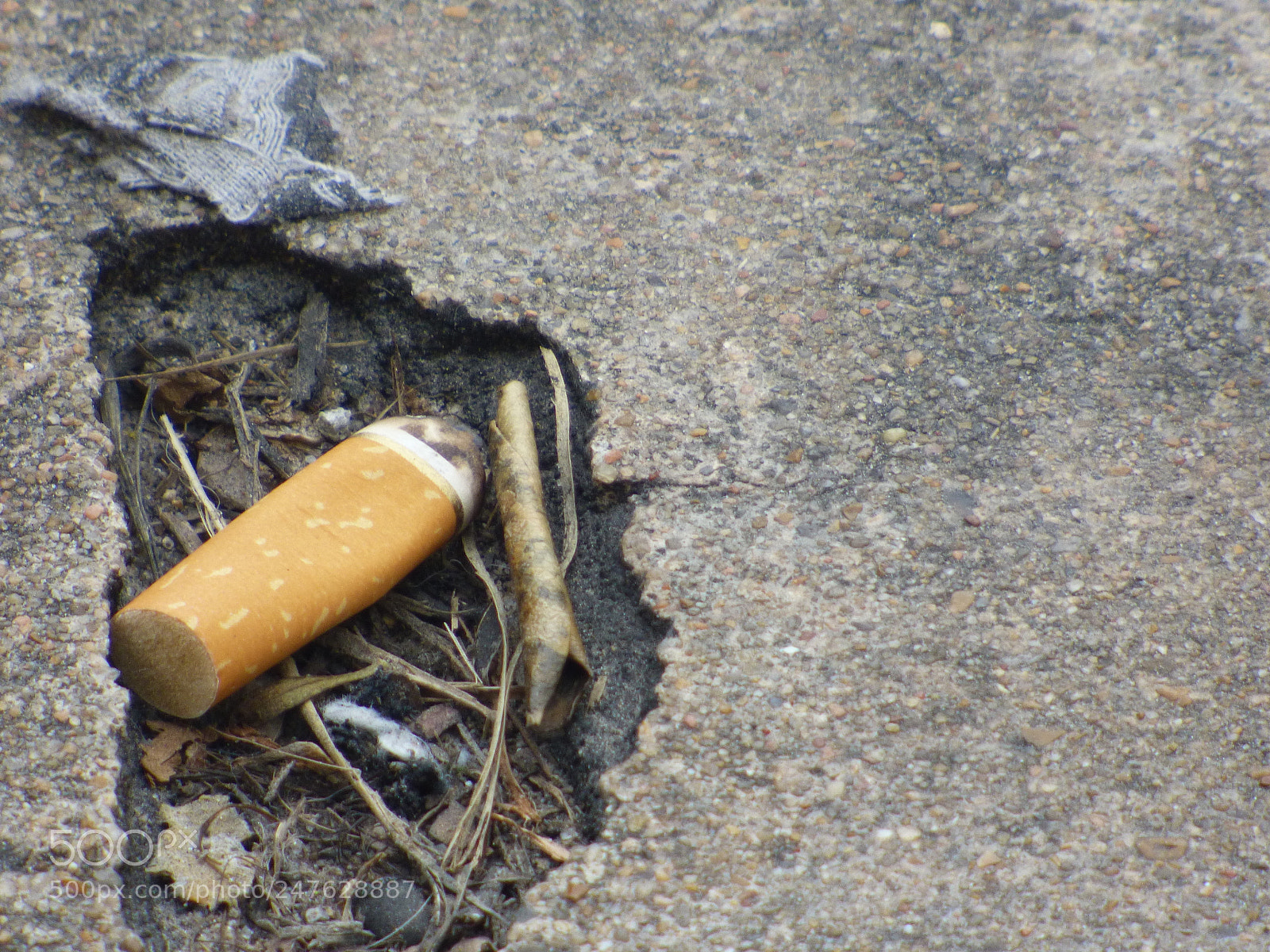 Panasonic Lumix DMC-FZ70 sample photo. Cigarette butt photography