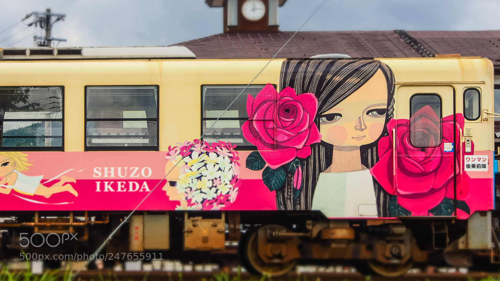 Olympus OM-D E-M1 sample photo. Wrapping facade train photography