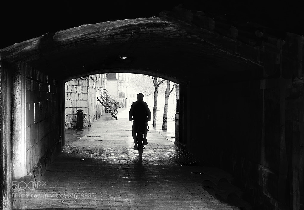 Panasonic Lumix DMC-FZ300 sample photo. Hombre en bicicleta photography