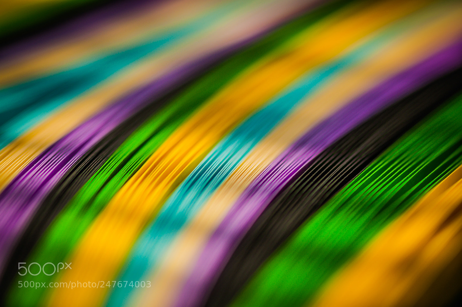 Nikon D5000 sample photo. A colored vinyl record photography