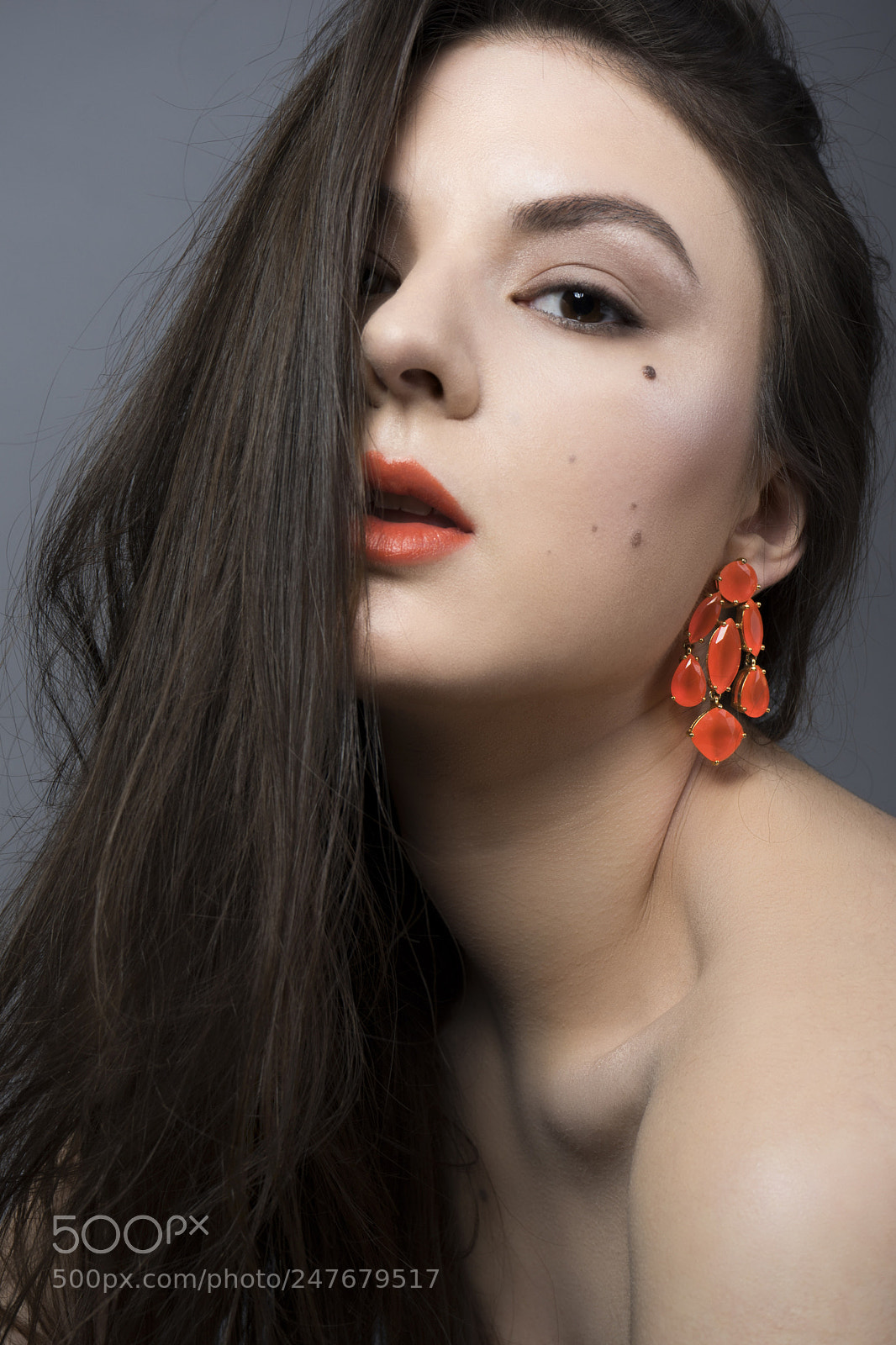 Sony a7 II sample photo. Orange earrings photography