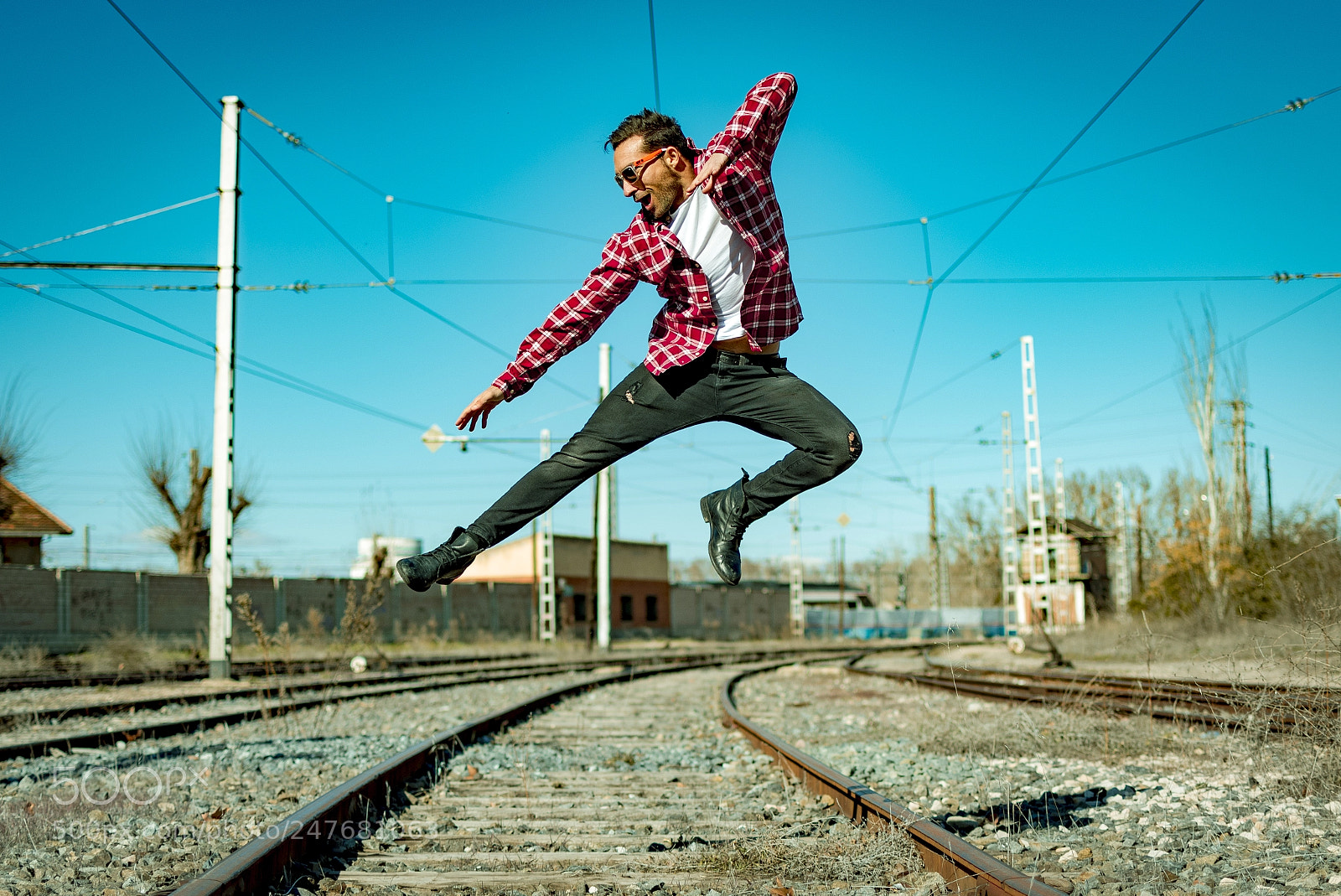 Nikon D5600 sample photo. Vias de tren salto photography