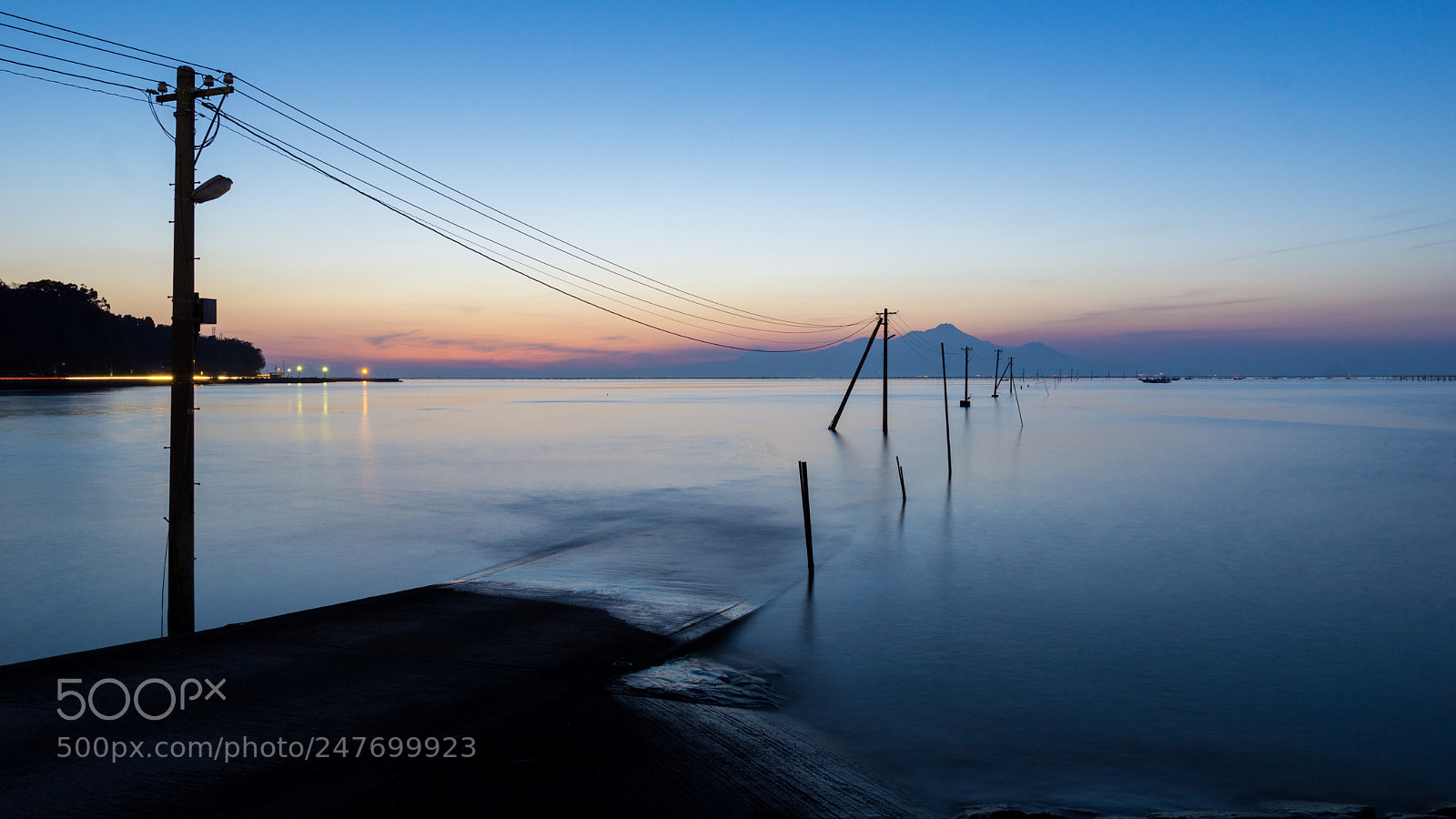 Sony a5100 sample photo. Telephone pole on ocean photography