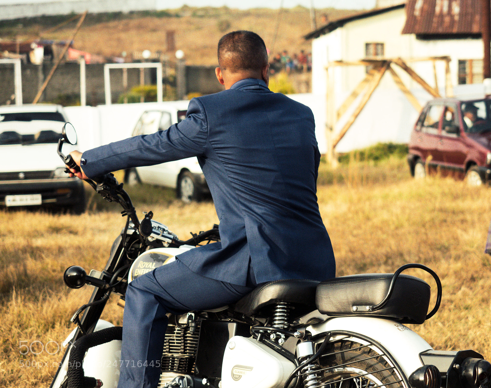 Olympus OM-D E-M5 II sample photo. Motorcycle in suit photography