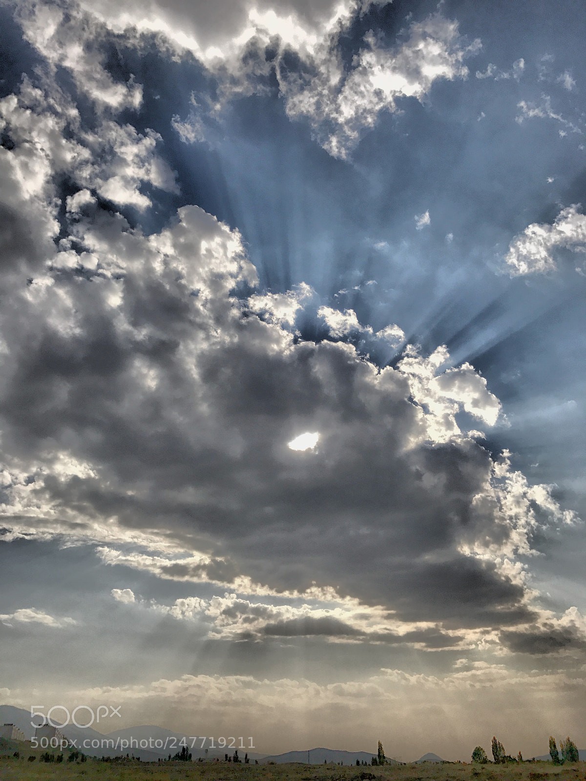 Apple iPhone 7 sample photo. Sun behind clouds photography