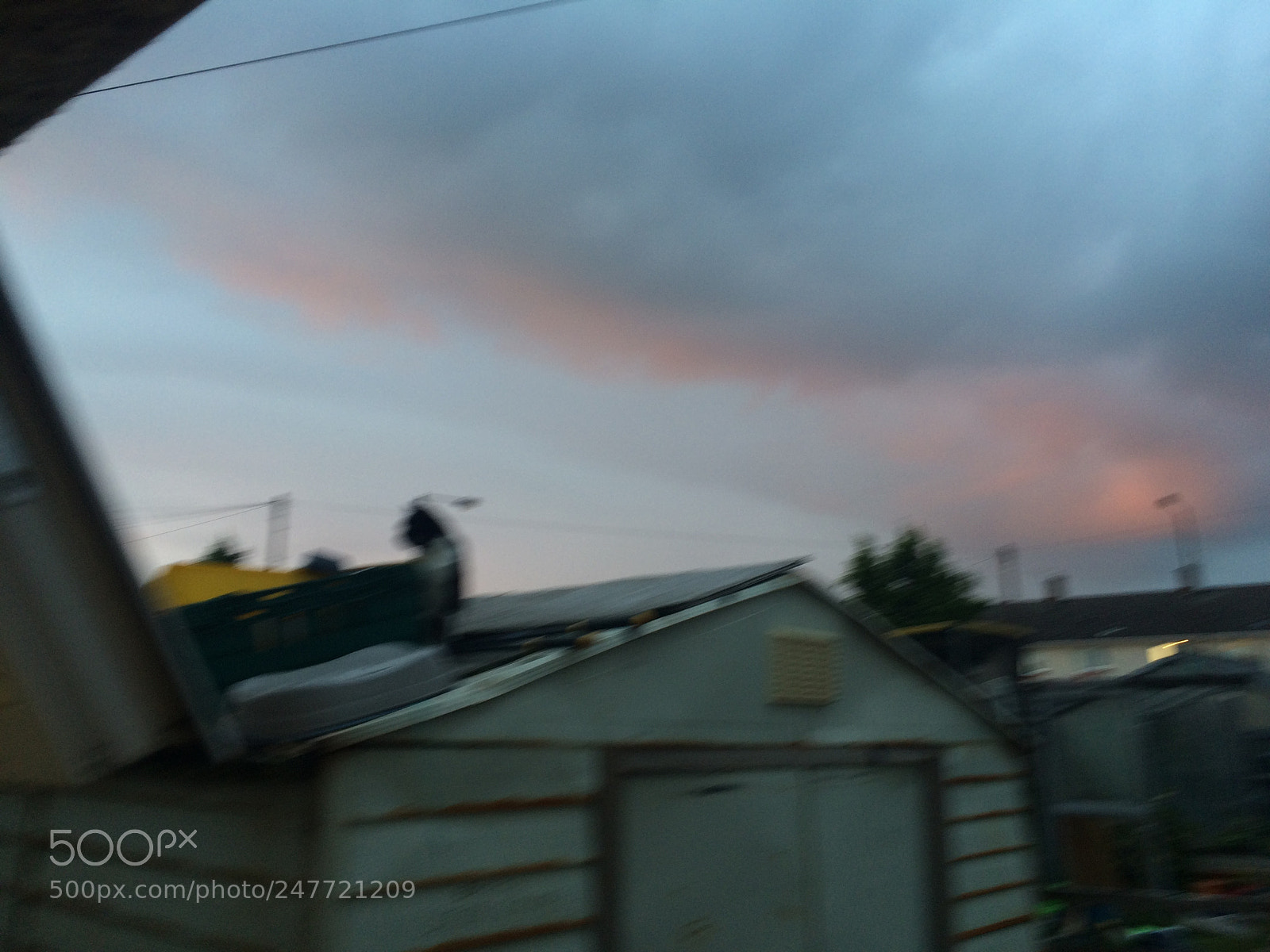 Apple iPhone 5s sample photo. Moody sky over houses photography