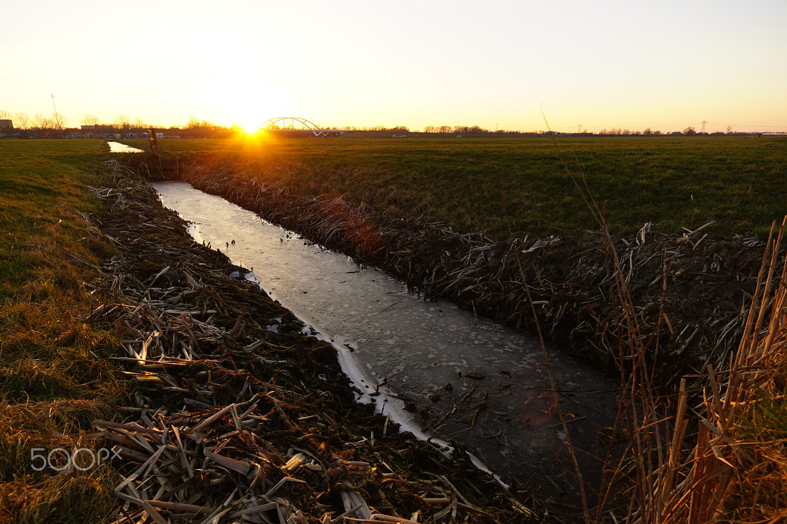 Sony a6000 + ZEISS Touit 12mm F2.8 sample photo. Noorderhogebrug freezing sunset 1 photography