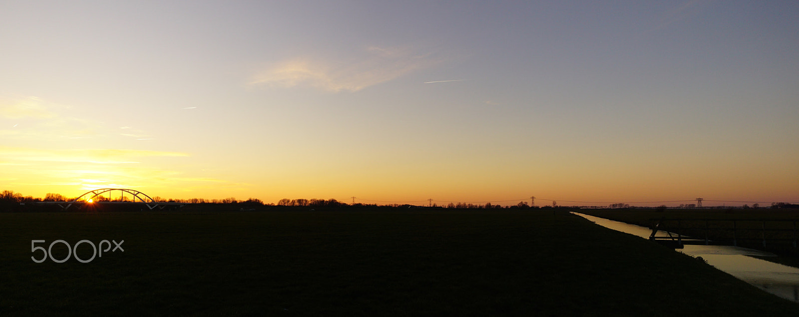 ZEISS Touit 12mm F2.8 sample photo. Noorderhogebrug freezing sunset 4 photography