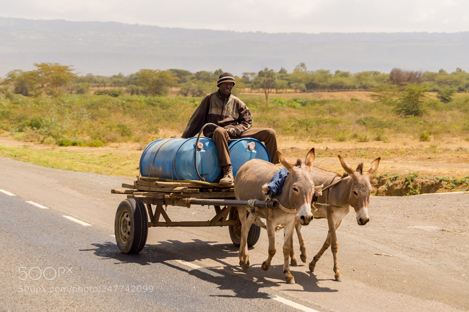 Nikon D3200 sample photo. Delivery man drinking water photography