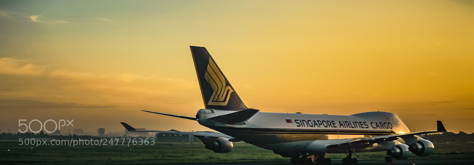 Nikon D3200 sample photo. Cargo plane on tarmac photography