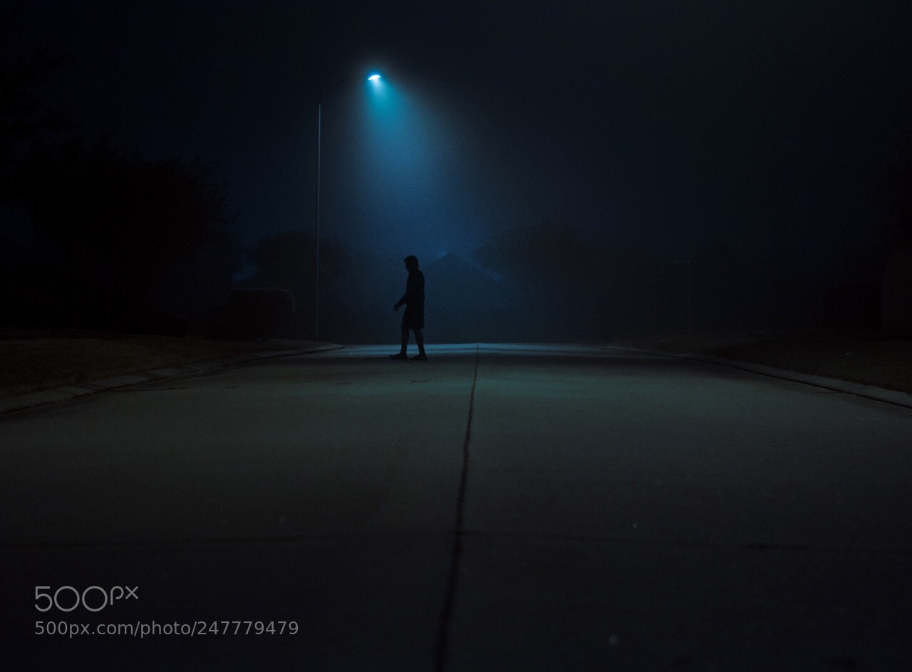 Nikon D7100 sample photo. Anonymous man walking photography