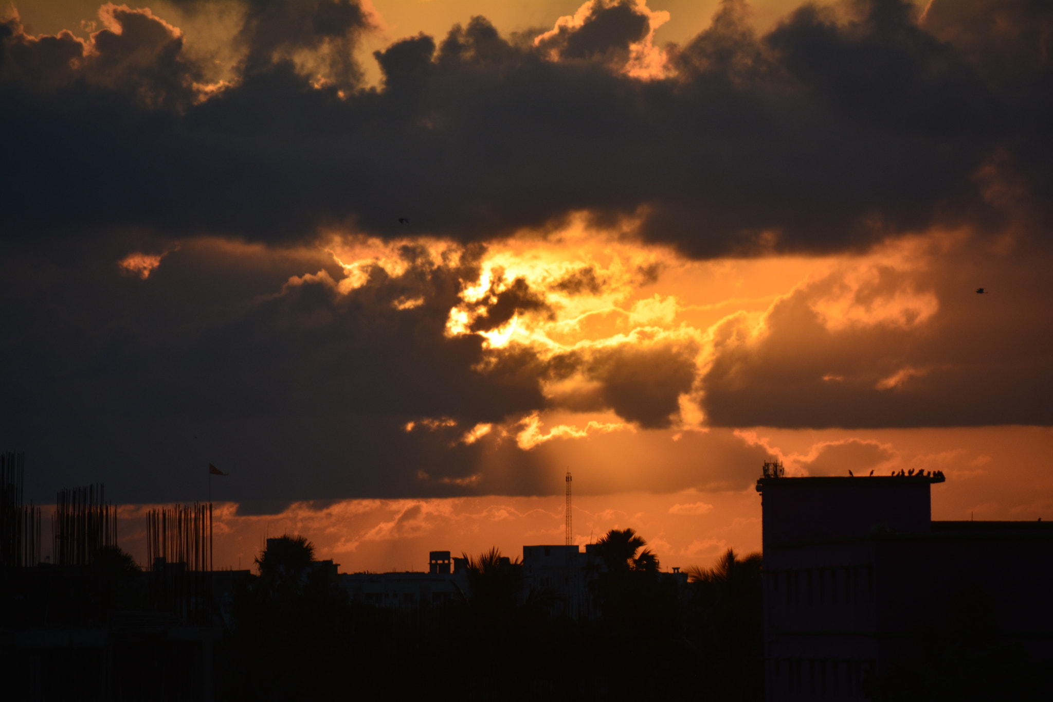 Nikon D5200 sample photo. Sun cover up under cloud photography
