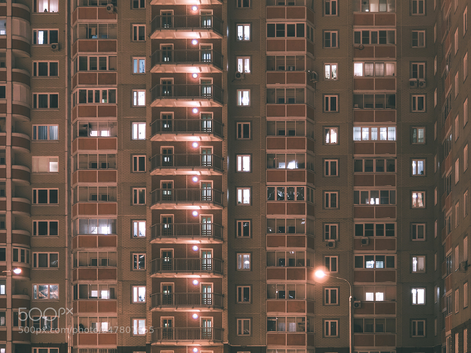 Olympus OM-D E-M5 II sample photo. Apartment building in night photography