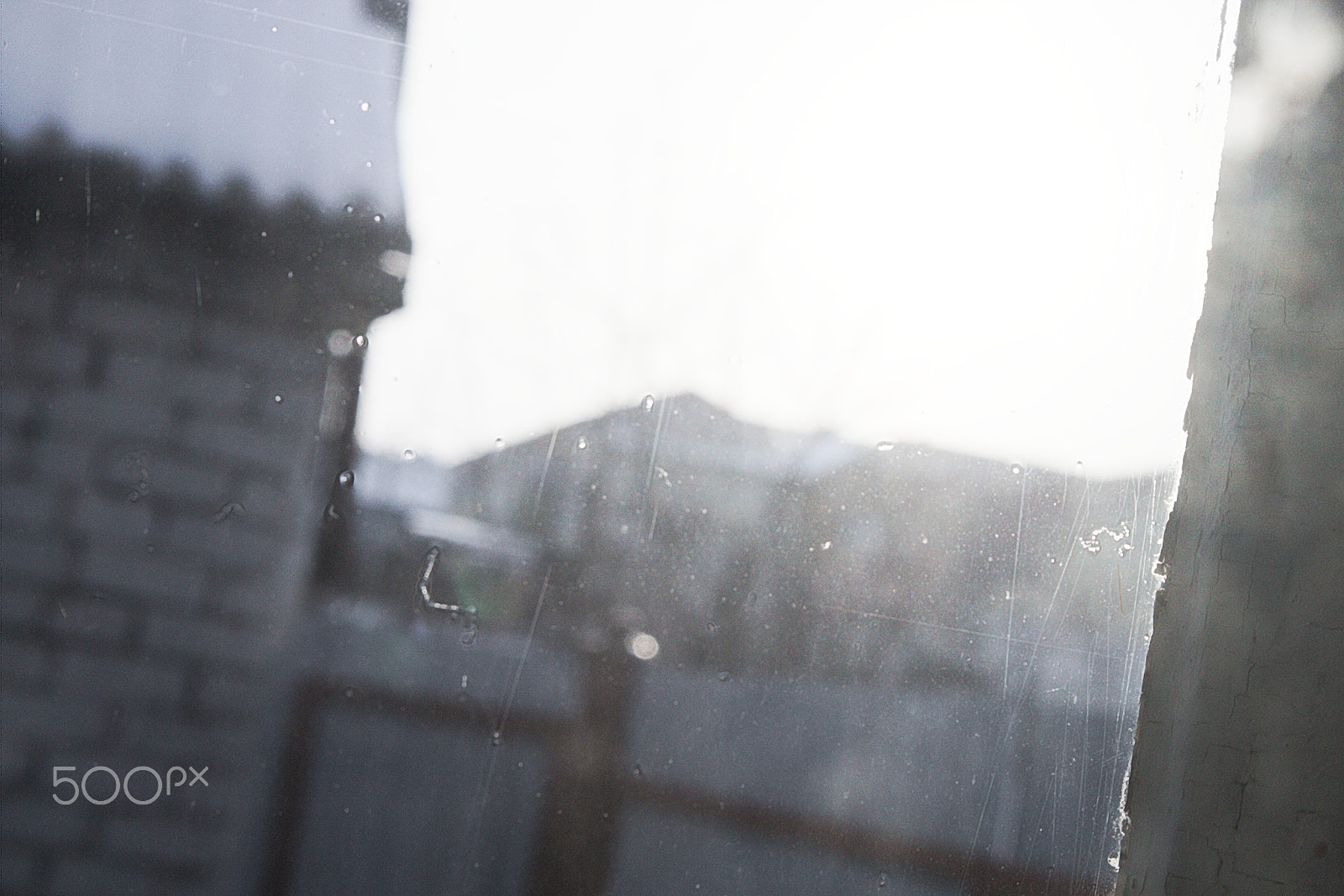 Canon EOS M10 sample photo. View from window to street in defocus photography
