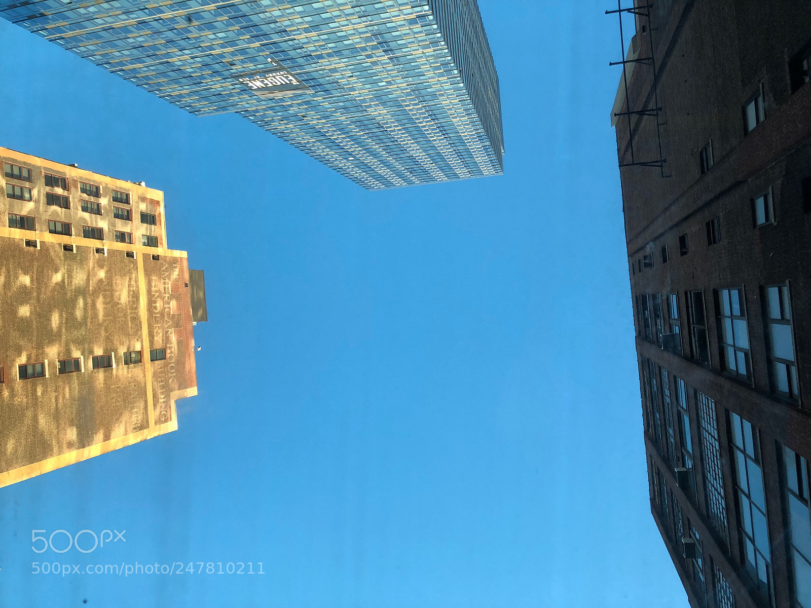 Apple iPhone X sample photo. Blue and buildings photography