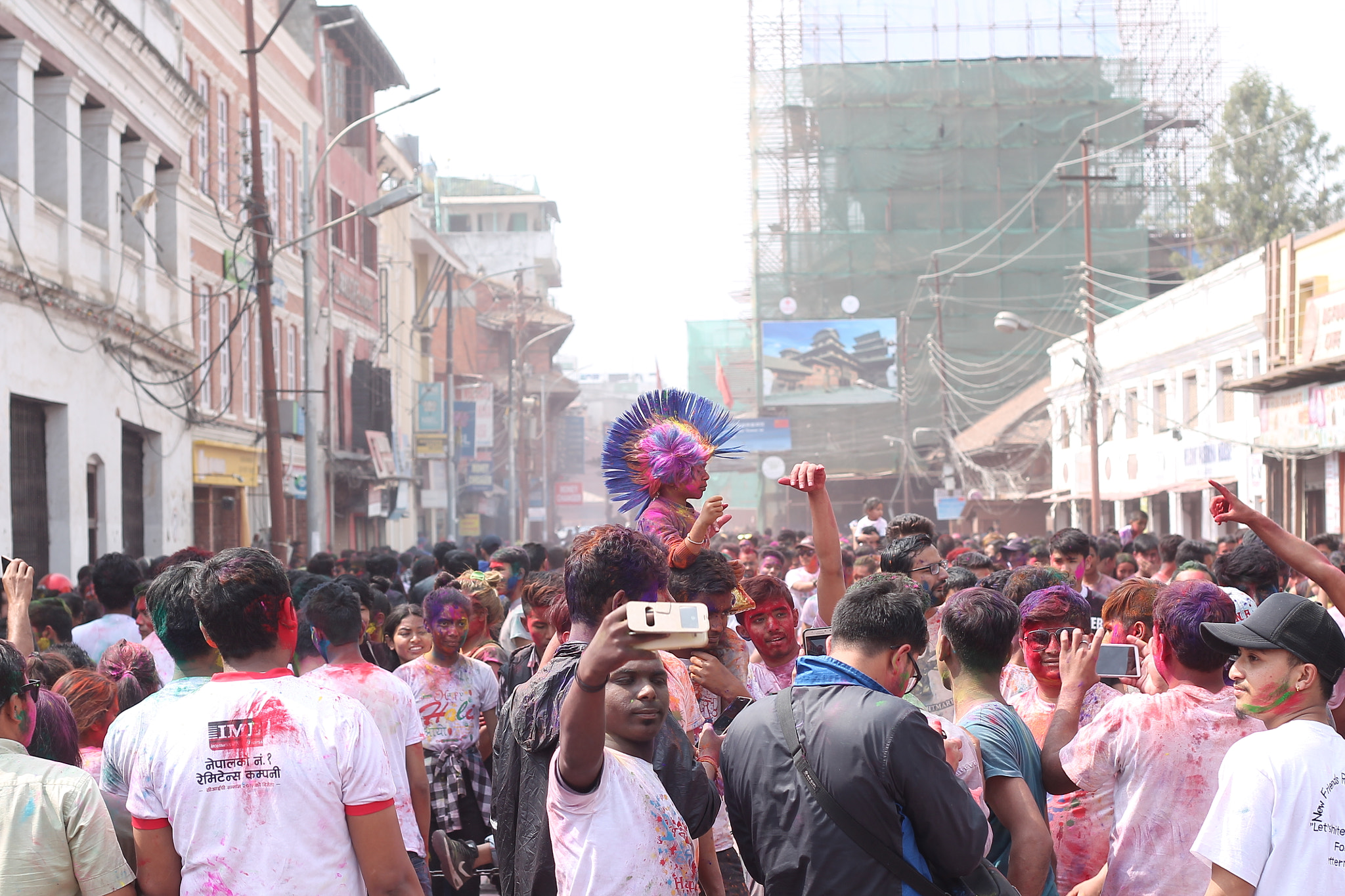 Canon EOS 1100D (EOS Rebel T3 / EOS Kiss X50) + Canon EF 50mm F1.8 II sample photo. Nepalese celebrating the hindu festival of colors, ... photography