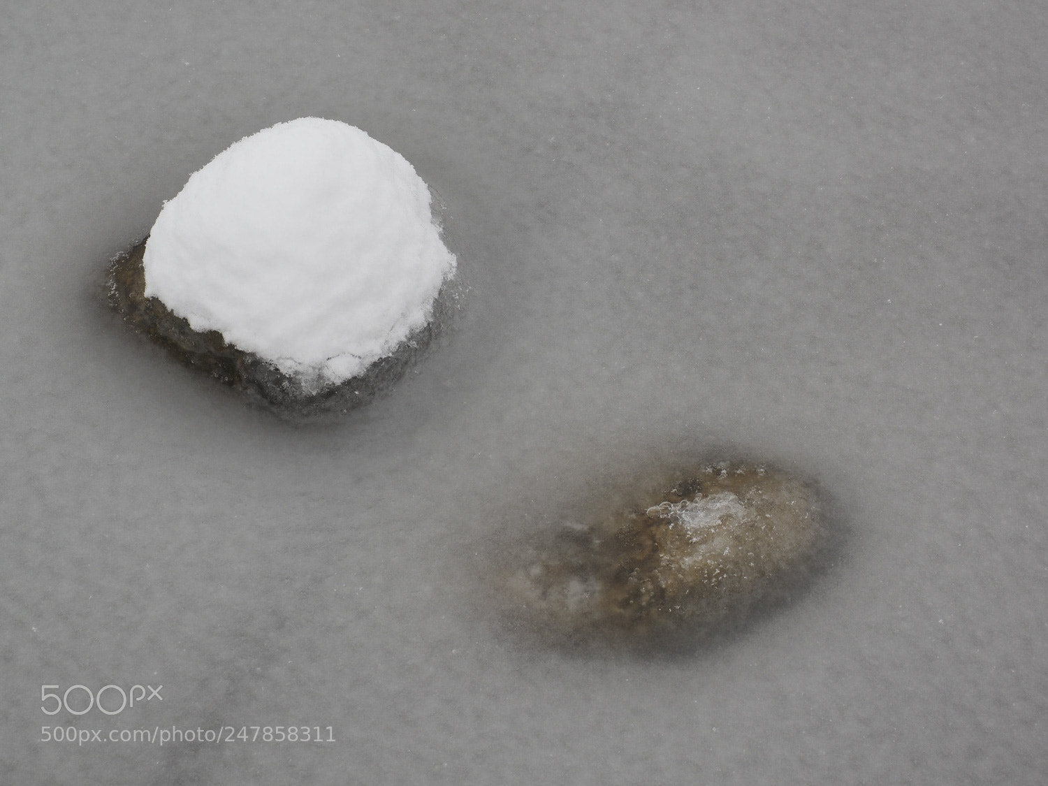 Olympus OM-D E-M1 sample photo. Stones in frozen lake photography