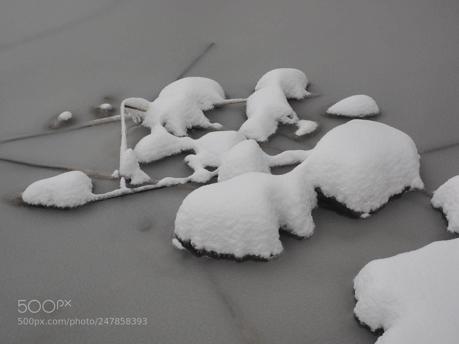 Olympus OM-D E-M1 sample photo. Stones in frozen lake photography