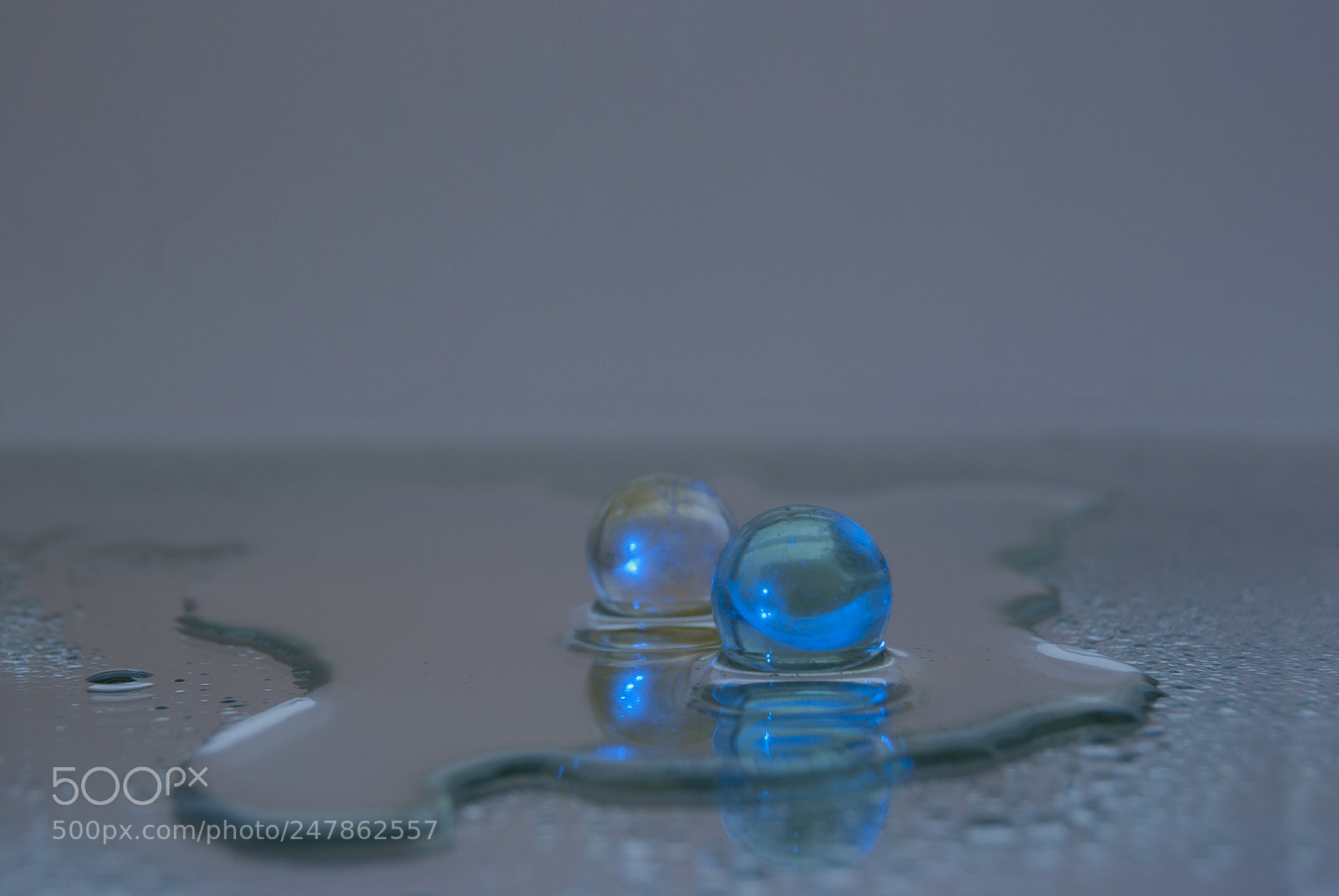 Nikon D60 sample photo. Small glass balls lie photography