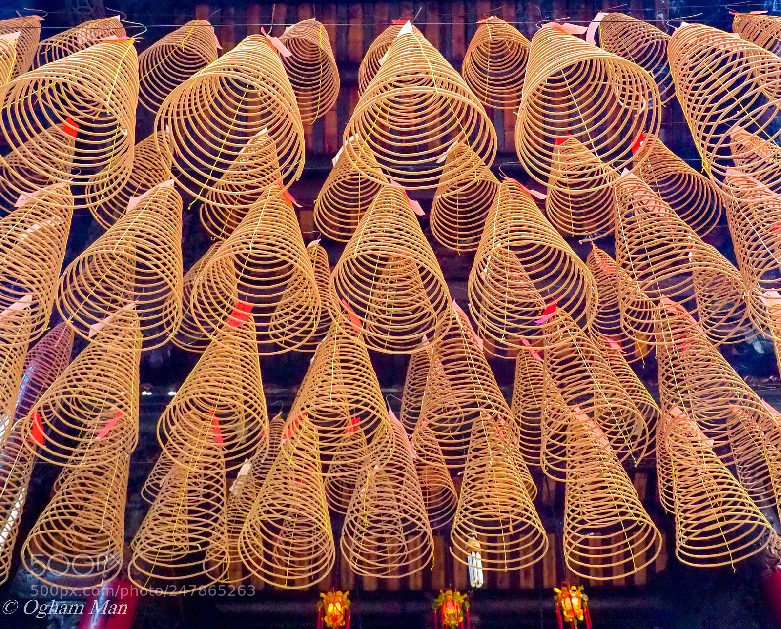 Olympus OM-D E-M1 Mark II sample photo. Votive incense in pagoda-saigon photography