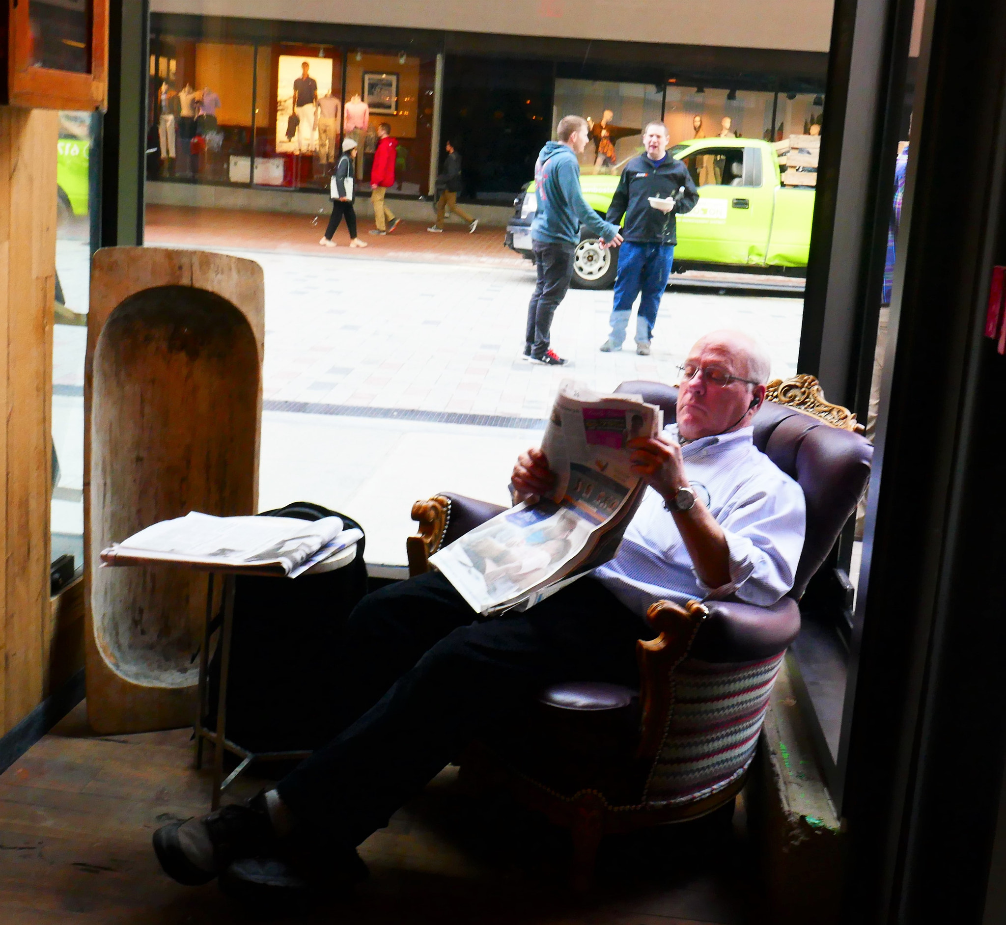Panasonic Lumix DMC-ZS100 (Lumix DMC-TZ100) sample photo. Reading the paper in a coffe shop on summer st photography