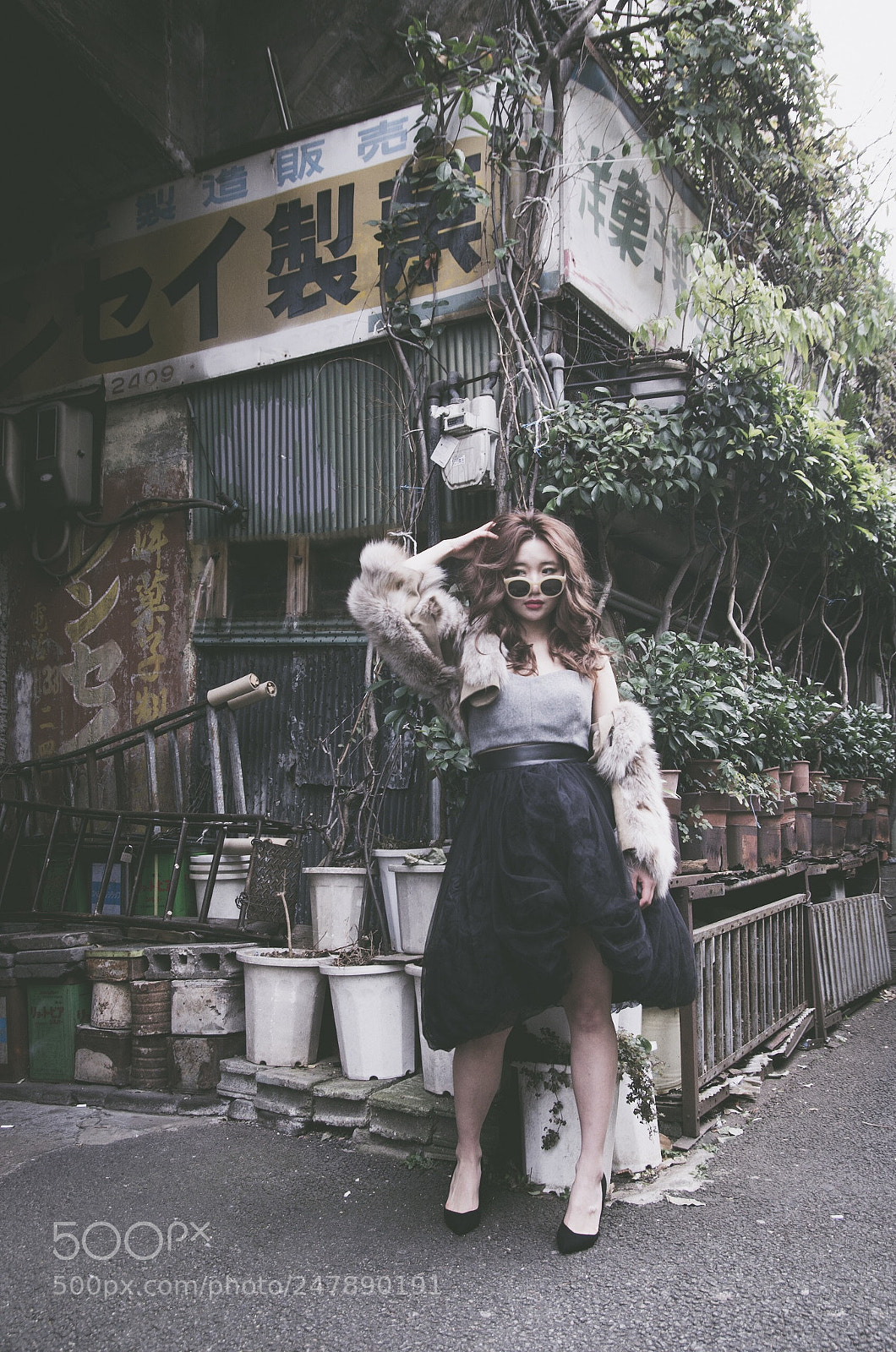 Pentax K-5 sample photo. Portrait in front of photography
