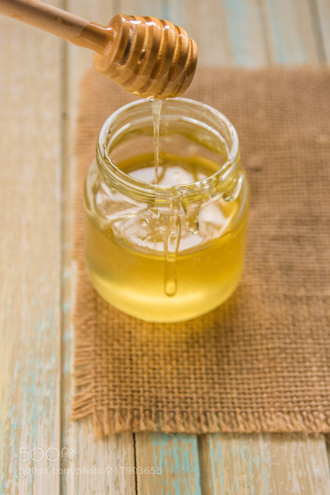 Canon EOS 600D (Rebel EOS T3i / EOS Kiss X5) sample photo. Honey pours with wooden photography