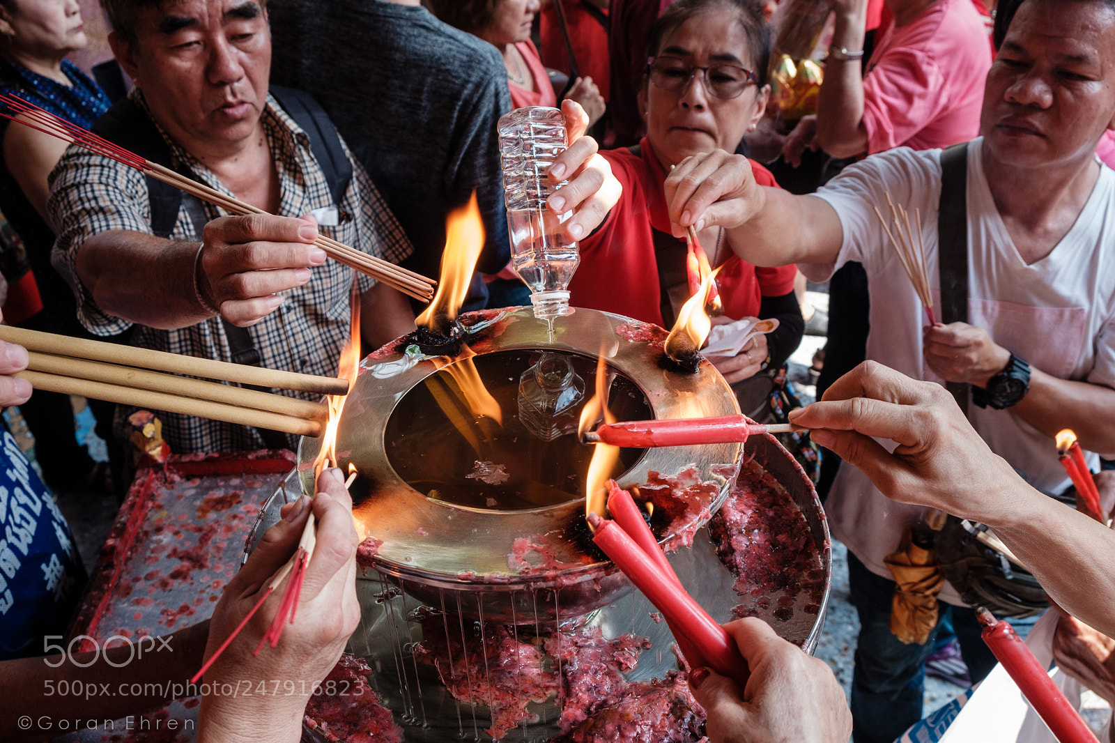 Fujifilm X-T2 sample photo. Lighting the incense photography