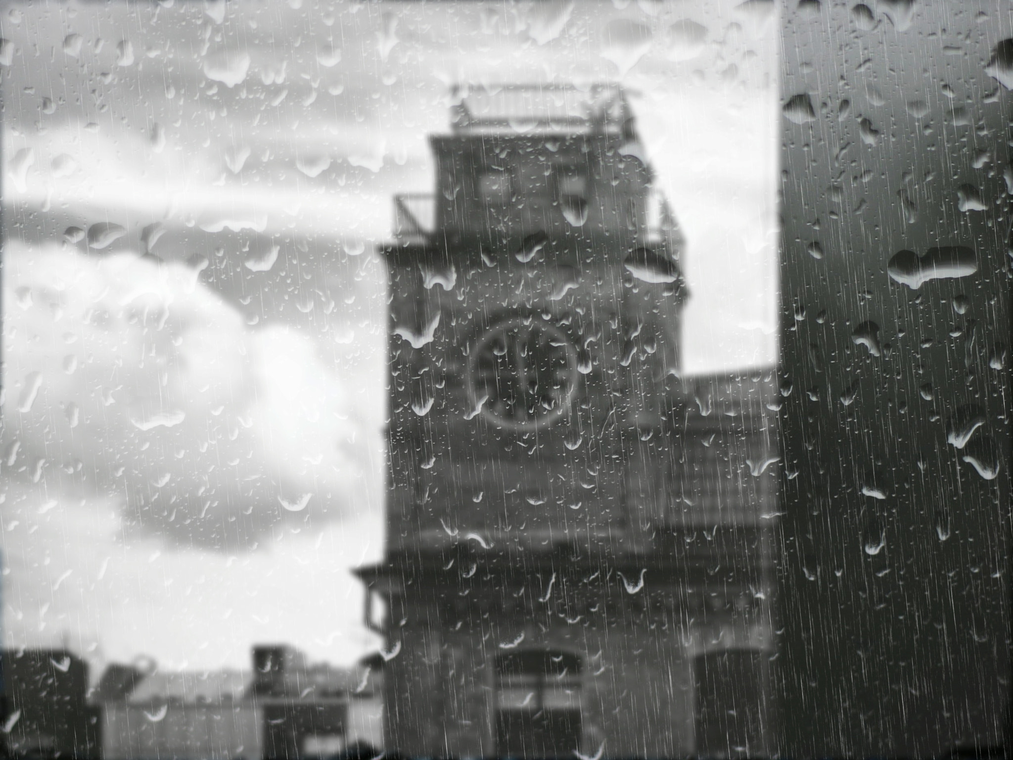 Panasonic DMC-FS62 sample photo. The clock tower in the rain photography