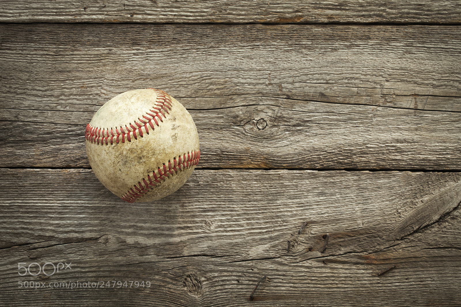 Canon EOS 5D Mark II sample photo. Old baseball on rough photography