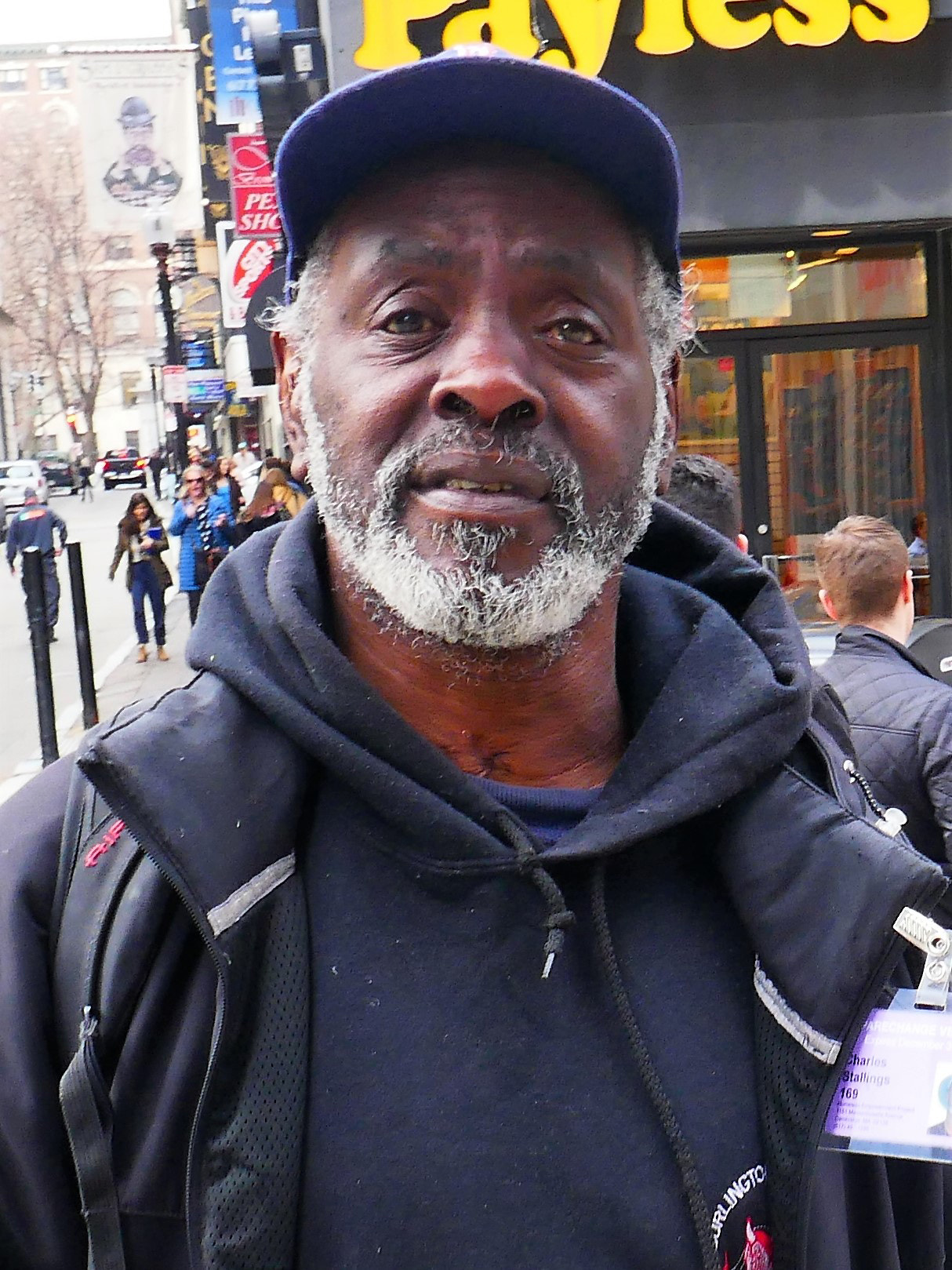 Panasonic Lumix DMC-ZS100 (Lumix DMC-TZ100) sample photo. Man selling newspapers to benifit boston homeless photography