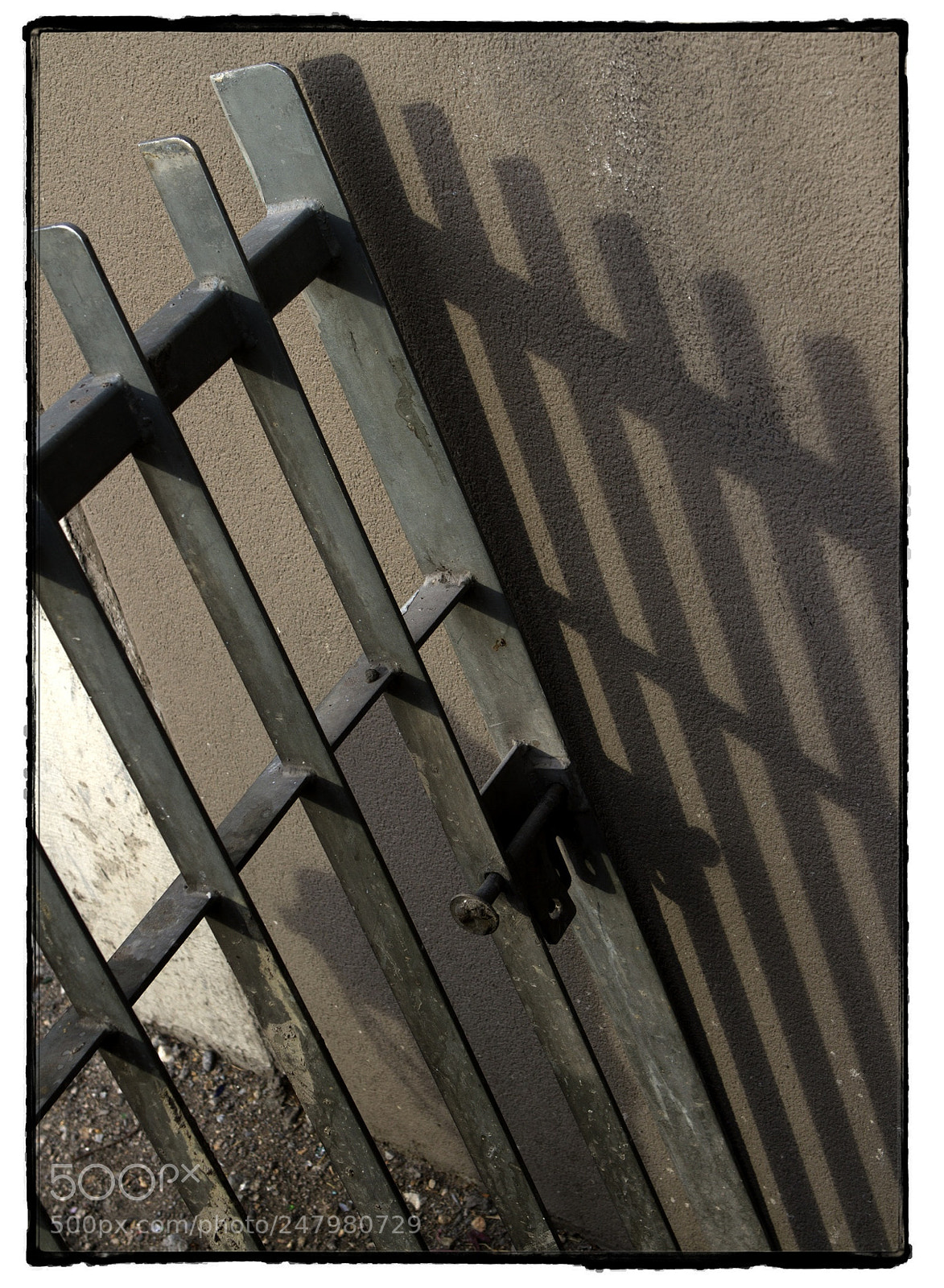 Canon EOS 7D sample photo. Gate and shadows. photography