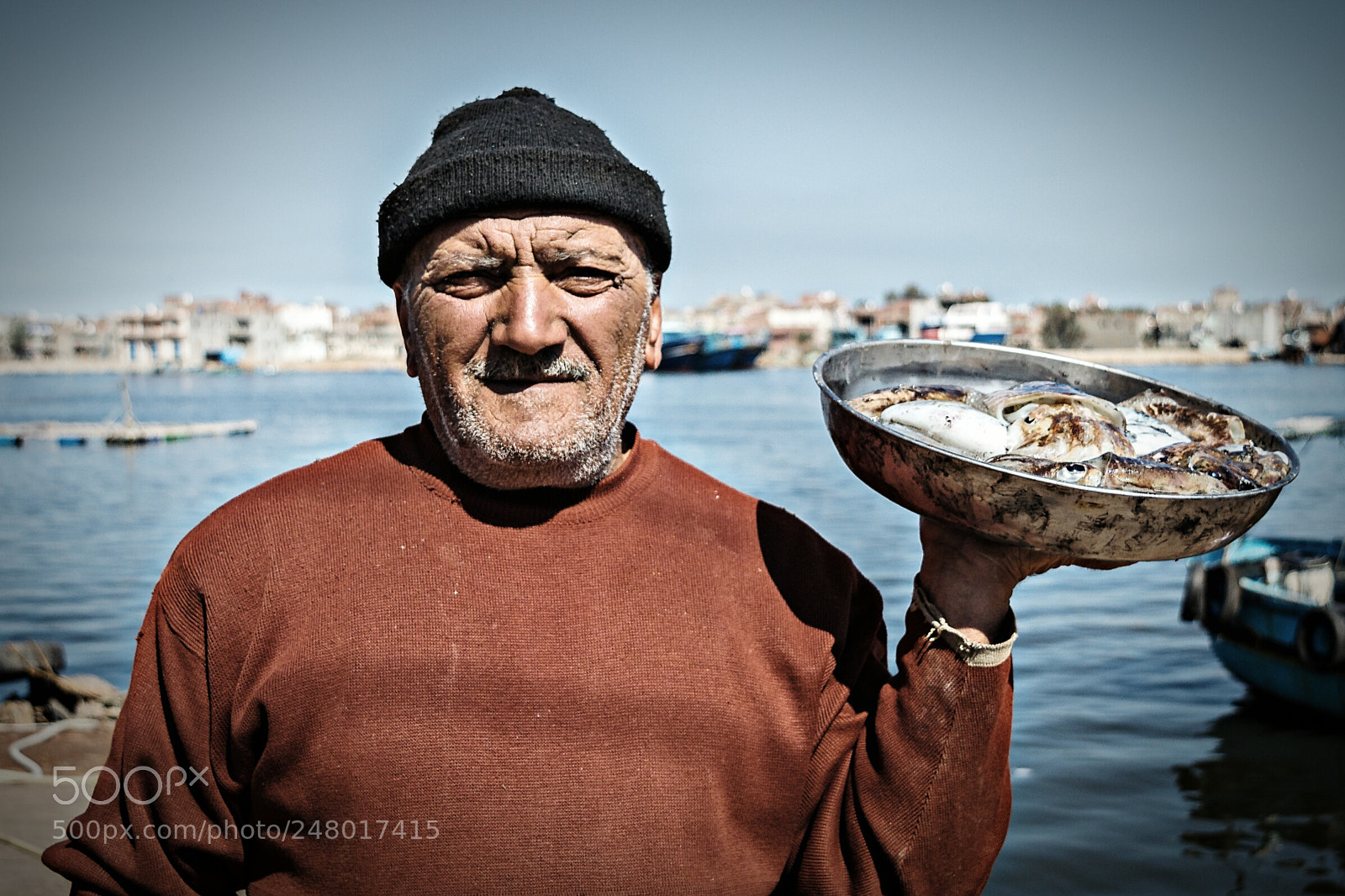 Nikon D3200 sample photo. Fisherman presenting the catch photography