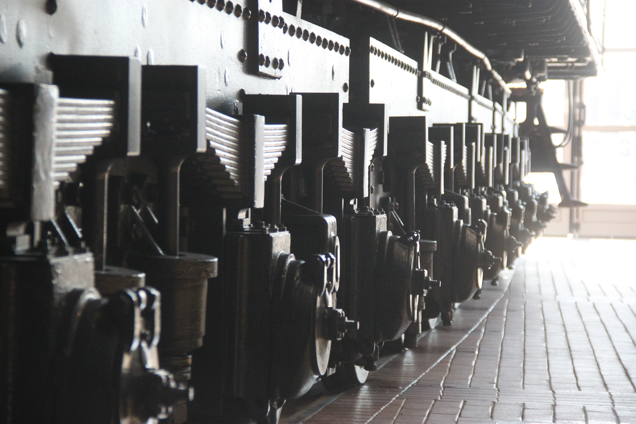 Canon EOS 500D (EOS Rebel T1i / EOS Kiss X3) sample photo. Black railroad wheels photography
