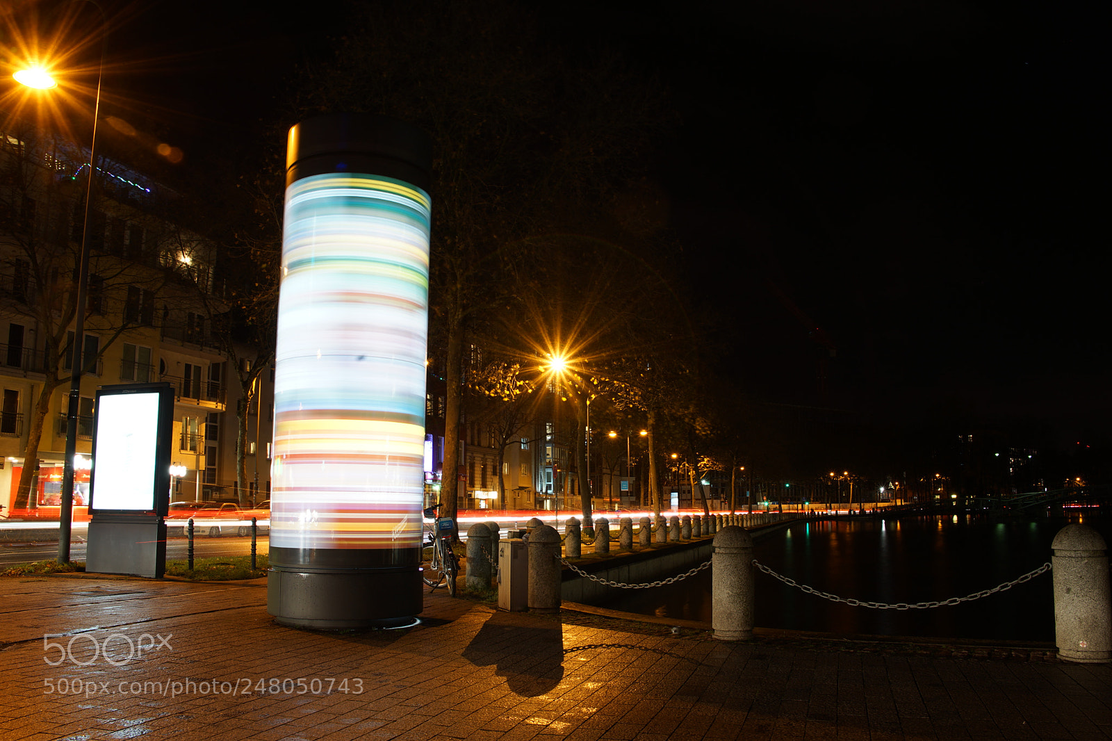 Sony a7 II sample photo. Rotating advertising column photography