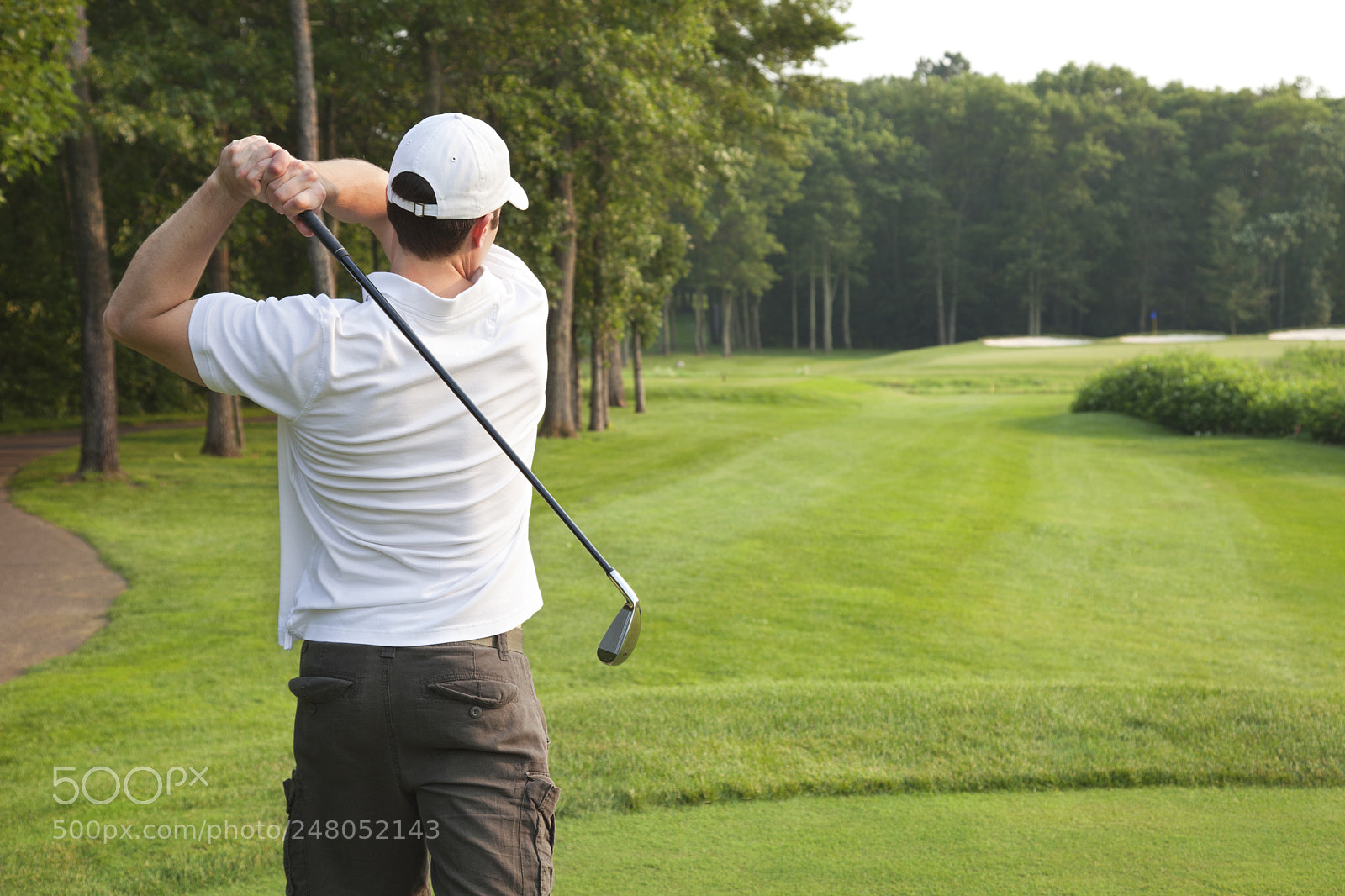 Canon EOS 5D Mark II sample photo. Young male golfer tees photography